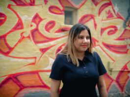Bharati Babbar on how ApplyKart, an all-professional networking platform, is changing the job seeking hunt for the new generation A person standing in front of a wall with graffiti Description automatically generated